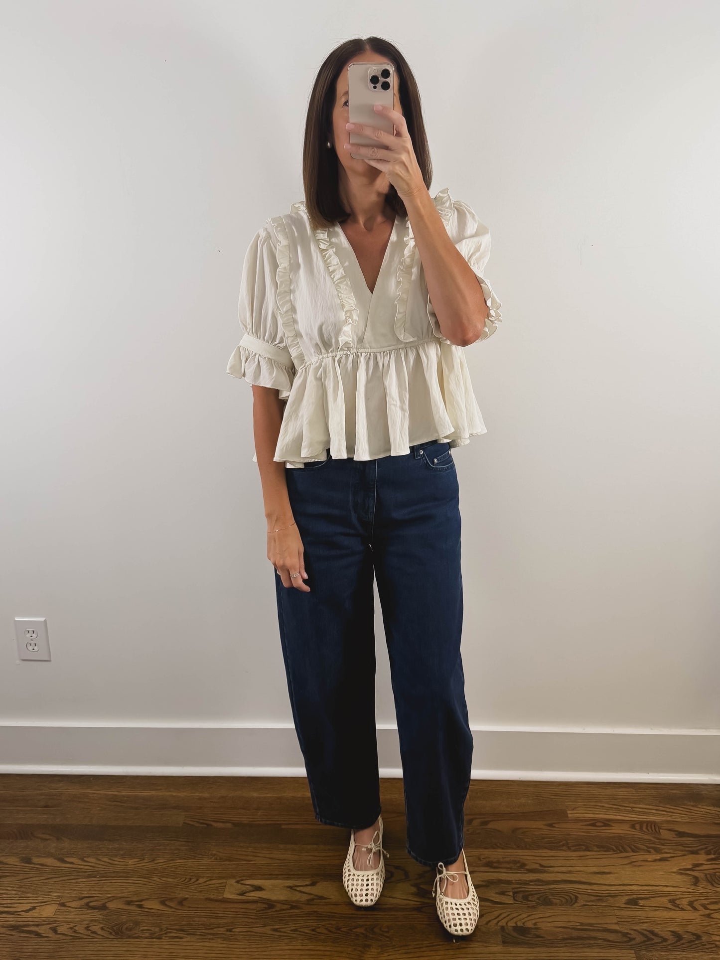 The Ruffle Peplum Top in Cream
