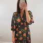 The Moody Floral Dress | Black Floral Smocked Three-Quarter Sleeve Midi Dress