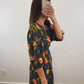 The Moody Floral Dress | Black Floral Smocked Three-Quarter Sleeve Midi Dress